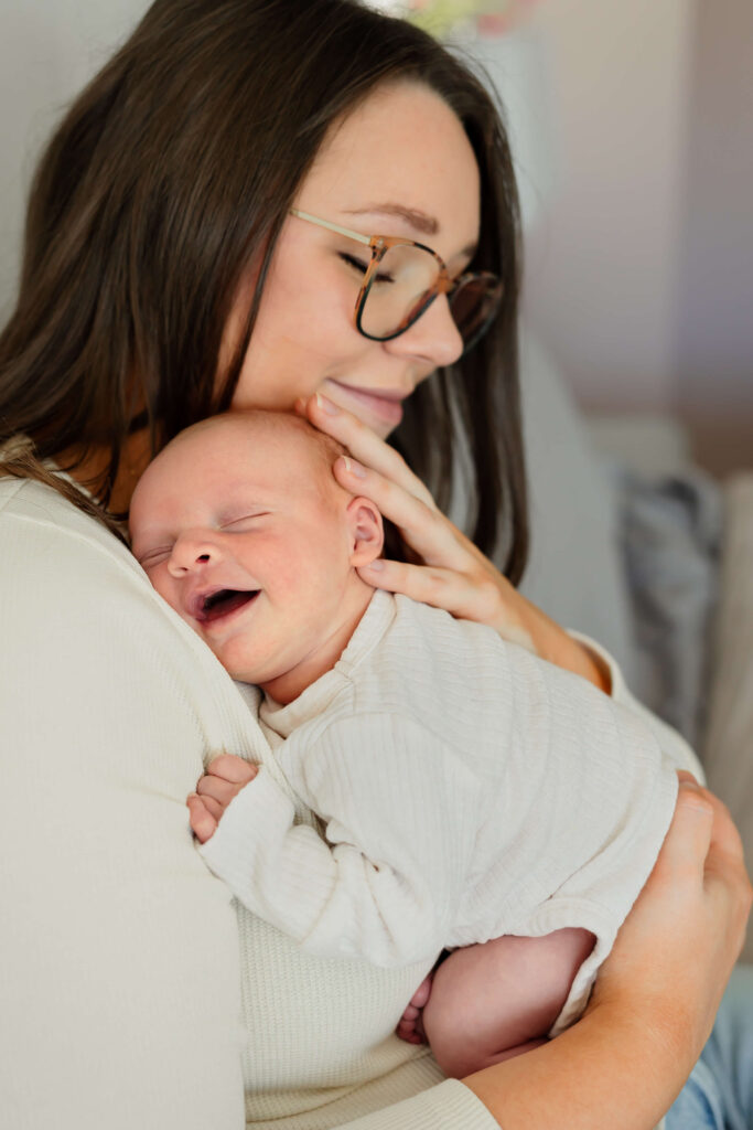 baby sleeping on mom