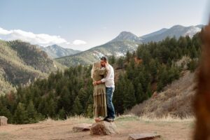 couple in an intimate pose in the Colorado mountains