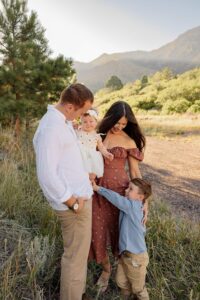 family looking at each other smiling