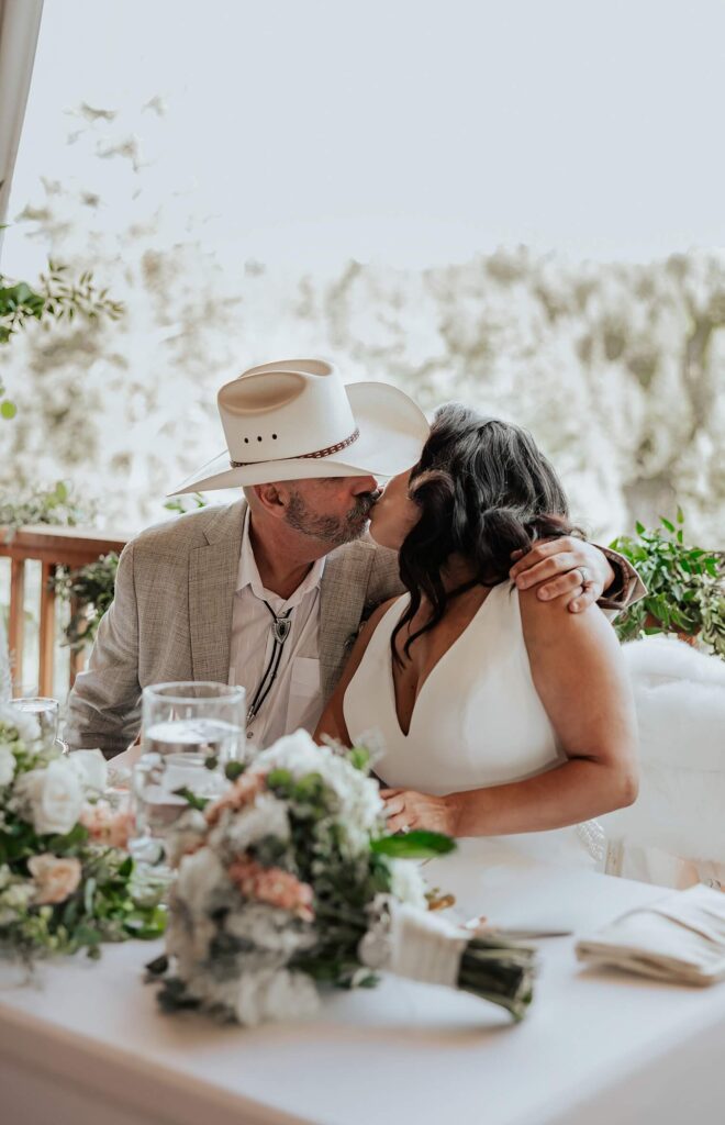 bride and groom kissing