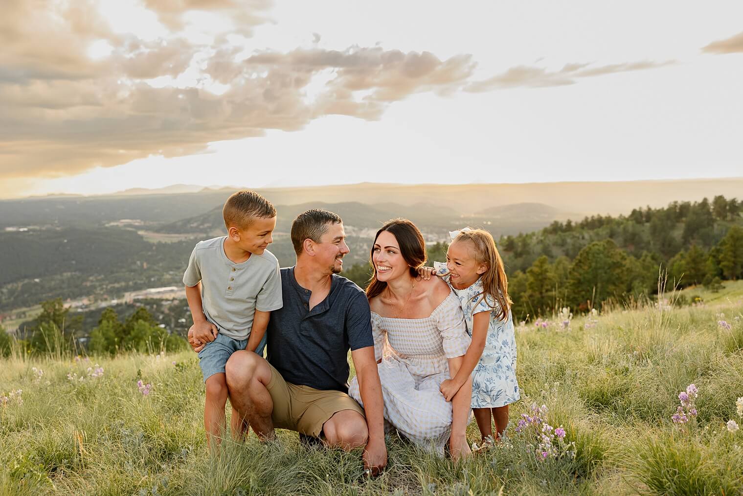 family smiling at each other