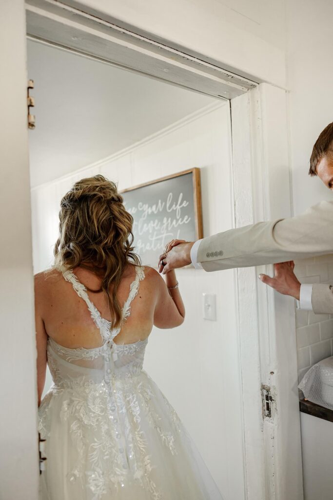 bride and groom holding hands