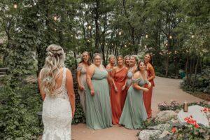 first look of bride with bridesmaids in Colorado Springs