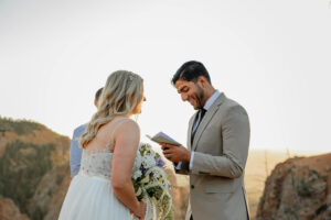 Bride and groom exchanging vows at their elopement in Colorado